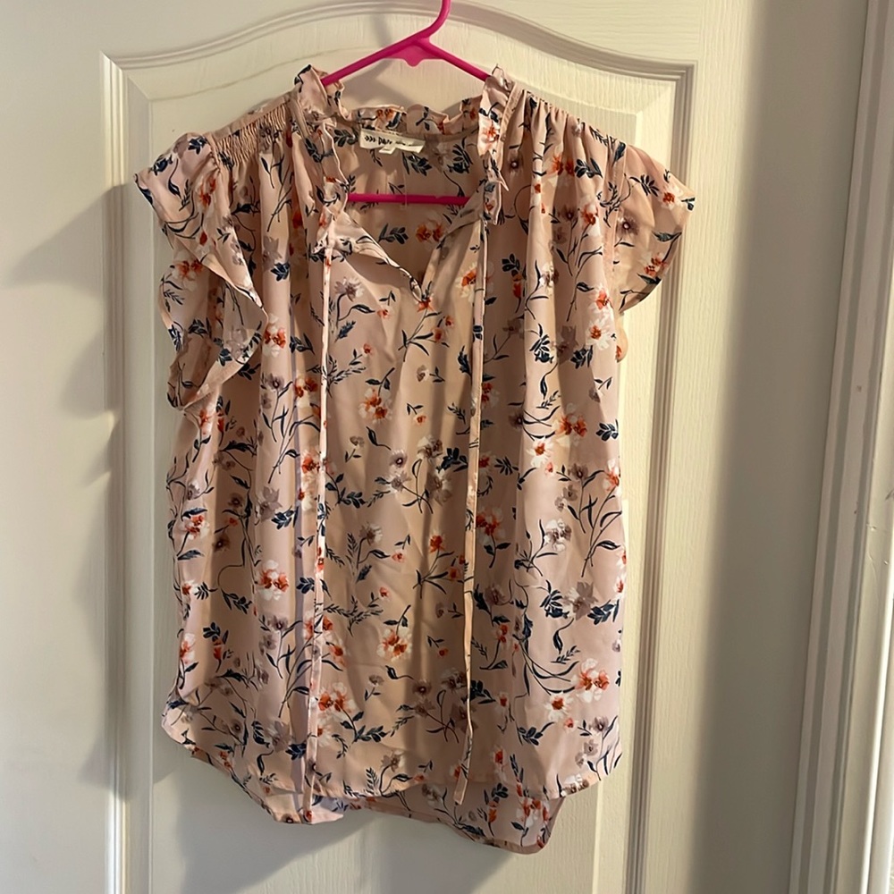 Women’s large flowered blouse.